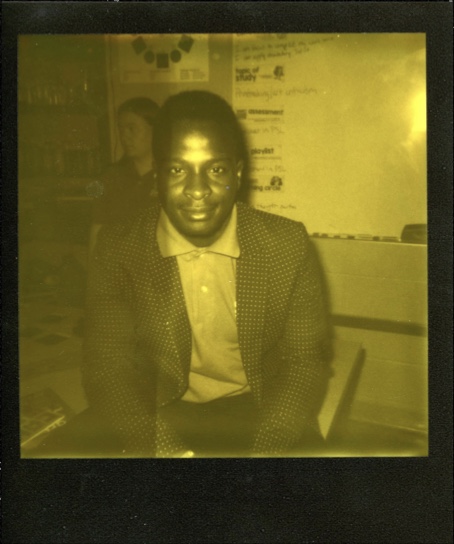 man-smiling-yellow-polaroid